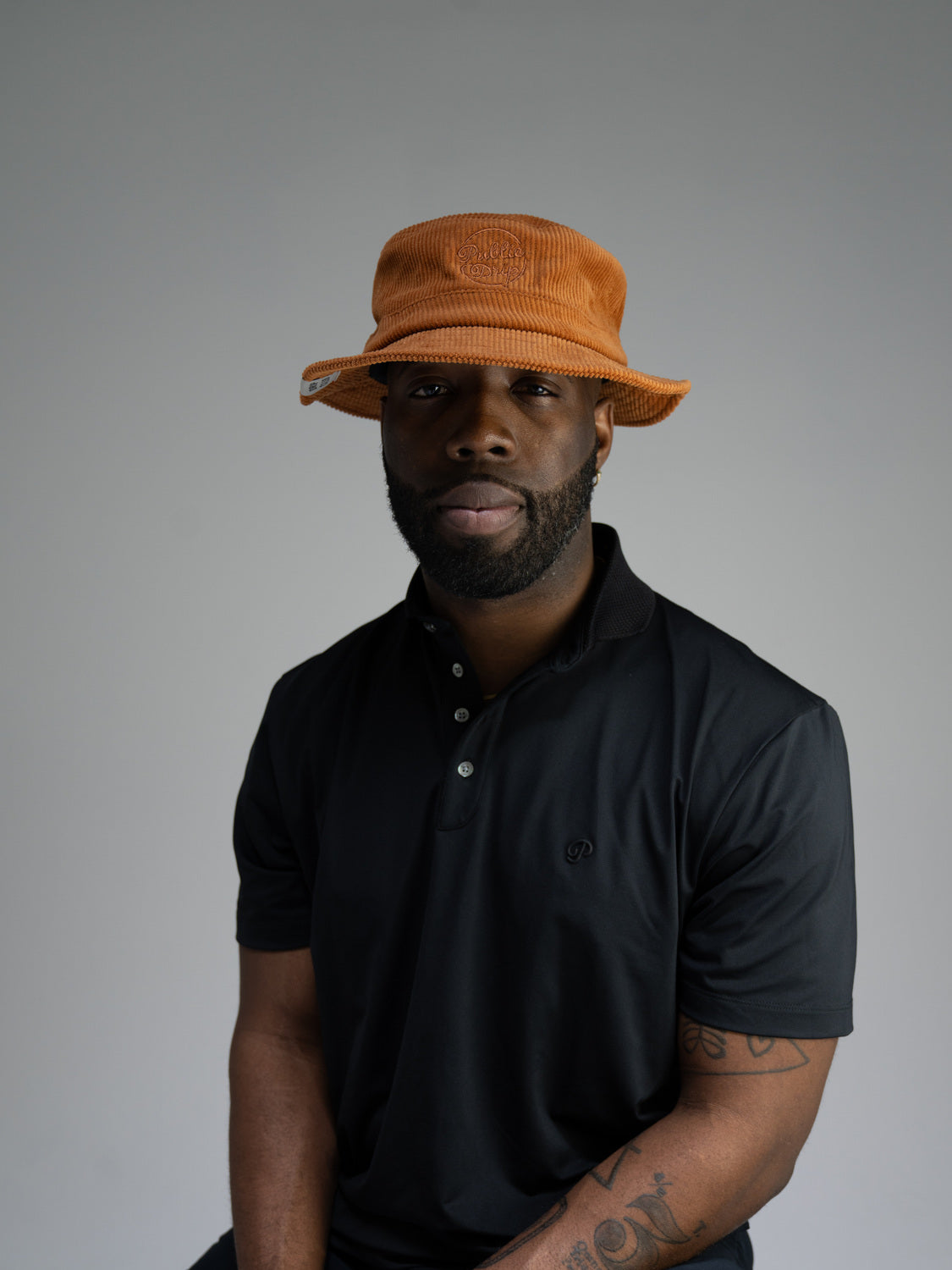 Public Athlete Tonal Polo (Black) — lifestyle